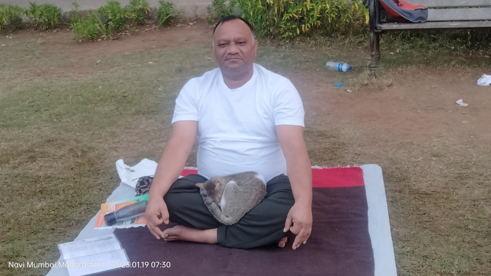 Sandeep Vyapari sitting calmly after outdoor yoga practice
